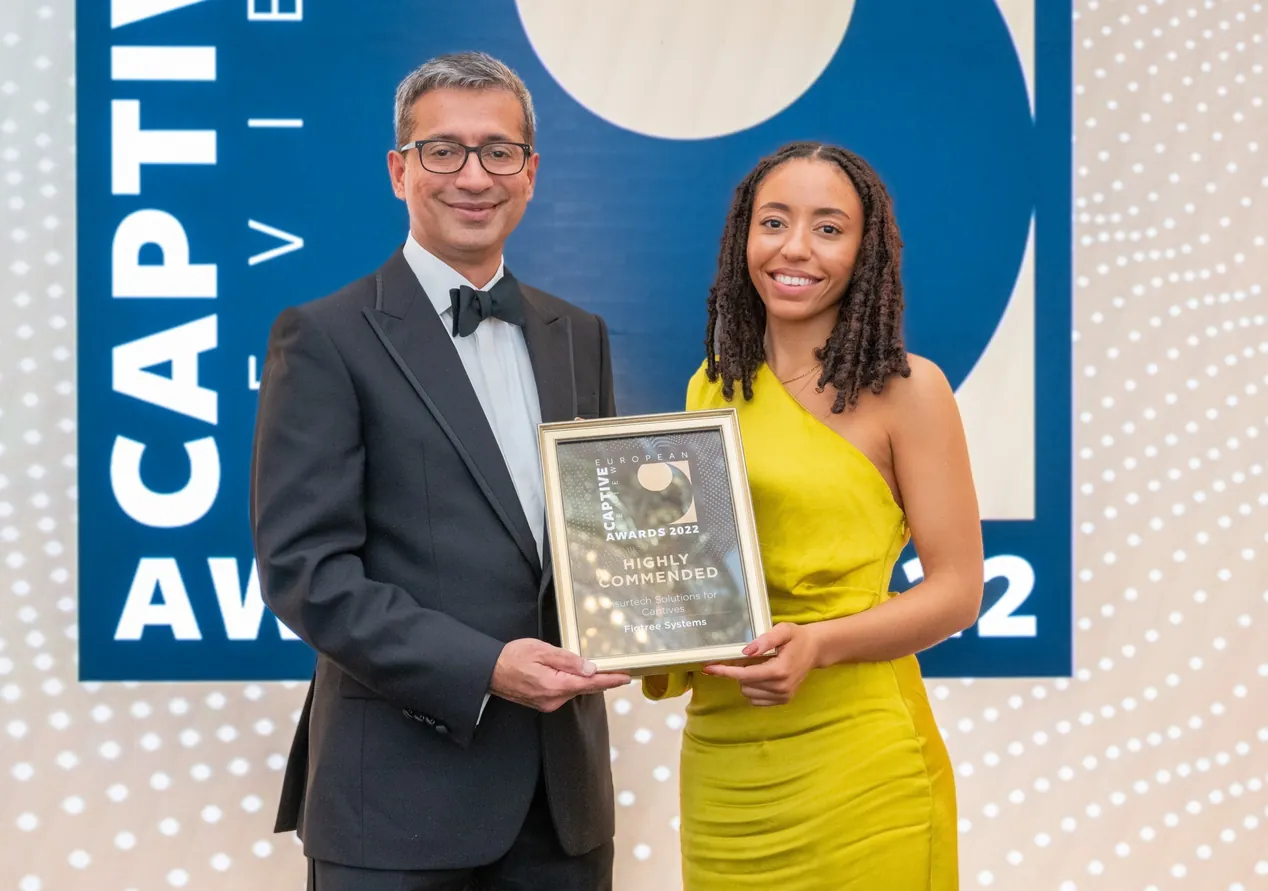 Figtree Systems Award Winners - accepting plaque