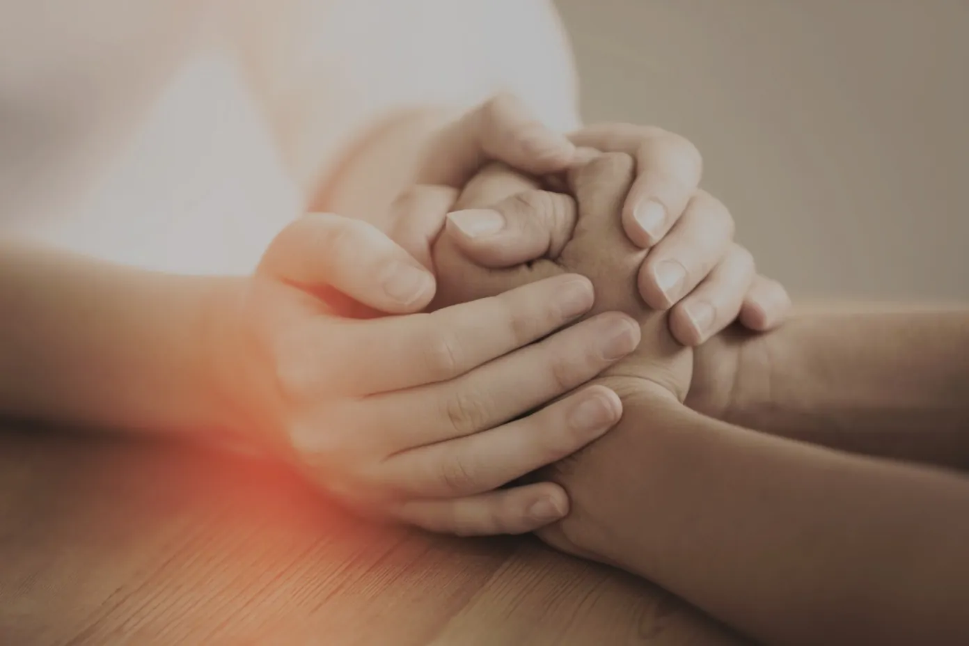 People holding hands — empathetic claims support