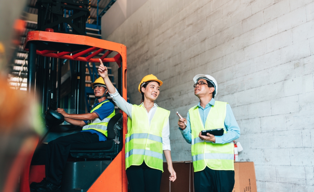 warehouse workers discuss their workplace